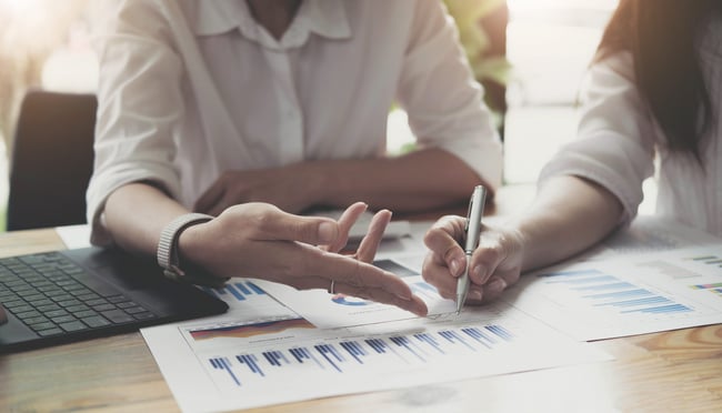 executives-and-accountants-are-holding-company-financial-statements-and-discussing-them-together-accountants-are-discussing-corporate-finance-meeting