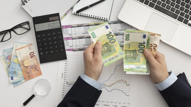 flat-lay-business-man-checking-finance-manners-scaled
