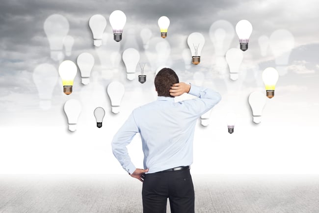 man-touching-her-head-and-looking-bulbs-scaled