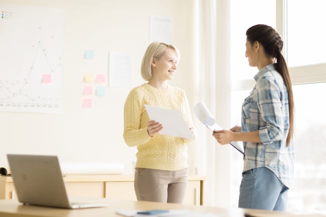 young-women-working-in-office-scaled