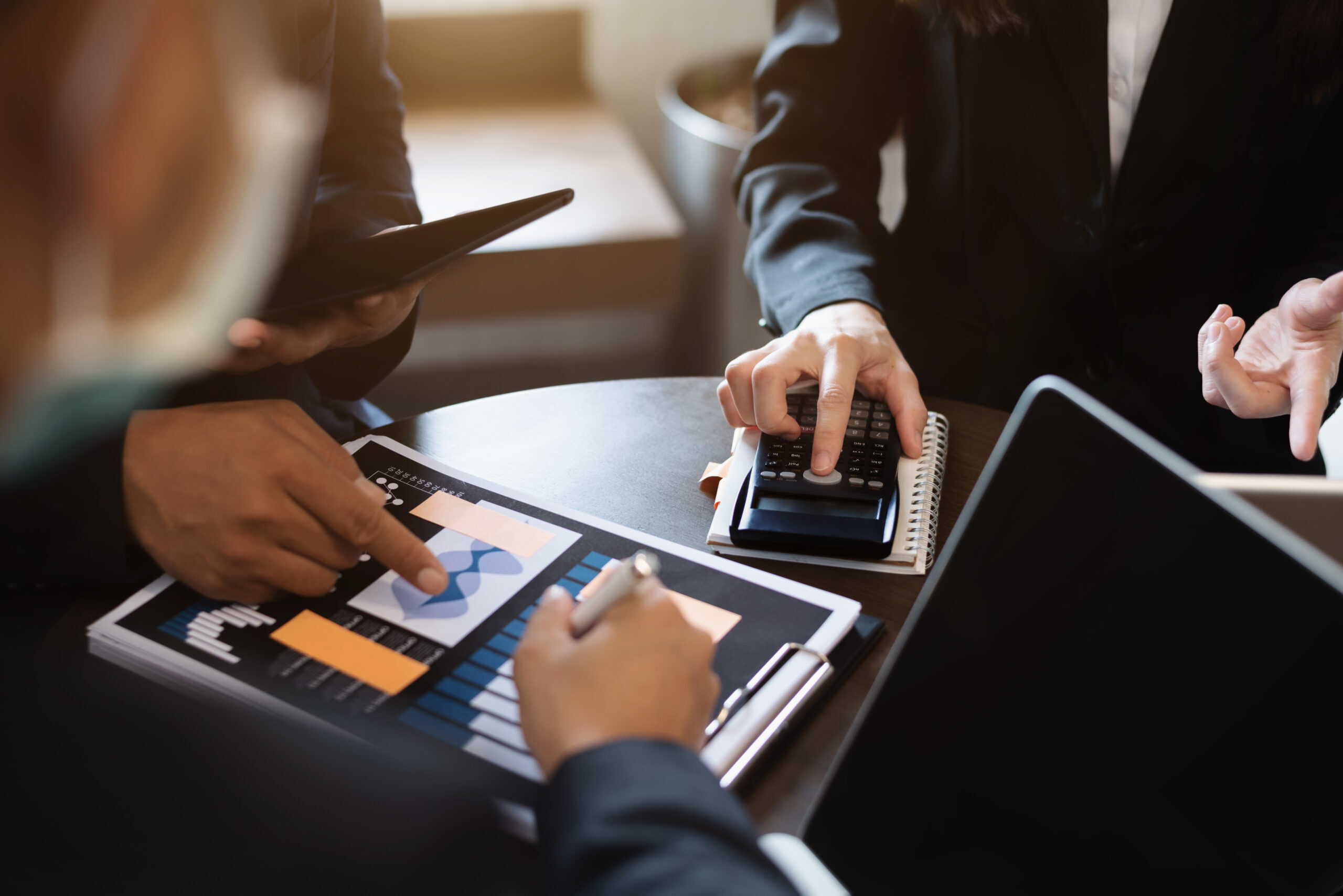 businessman-administrator-financial-audit-and-secretary-making-reports-calculating-balance-income-audit-service-within-audit-concept-scaled